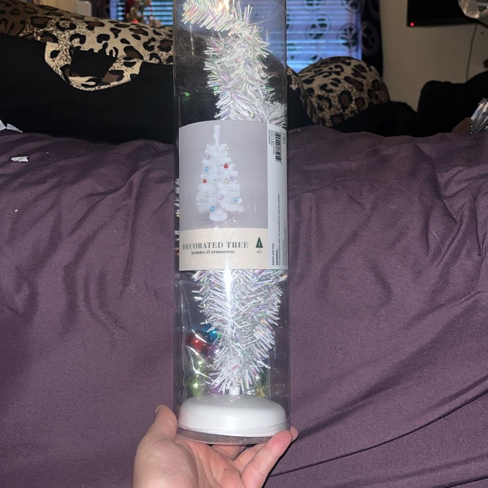 Tiny Christmas tree with decorations